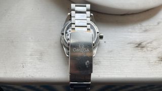 Duncan' Omega Seamaster 300 with scratched bracelet clasp