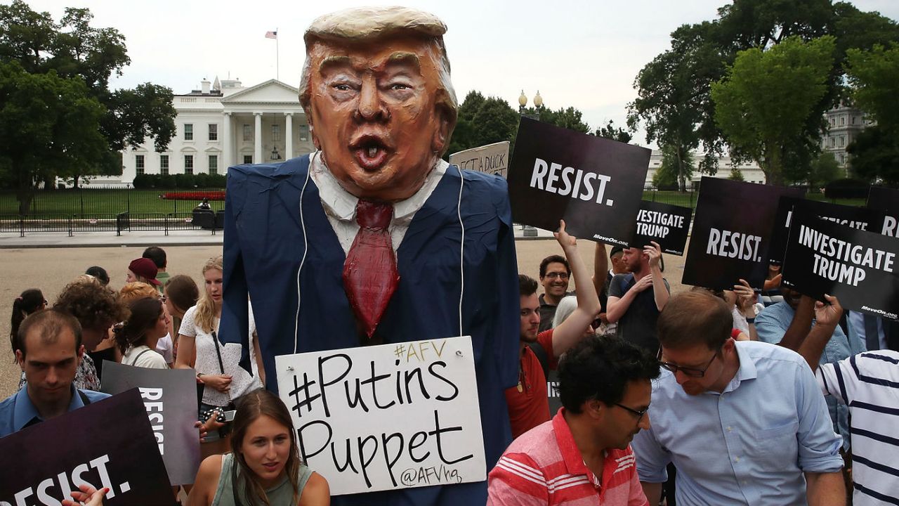 Anti-Trump protesters outside the White House last year