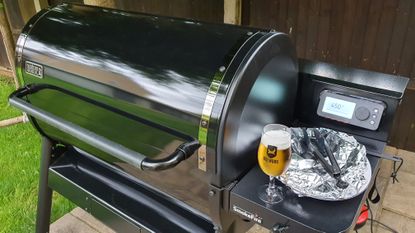 Weber SmokeFire EPX 6 being used by BBQ expert Robert Jones to cook food