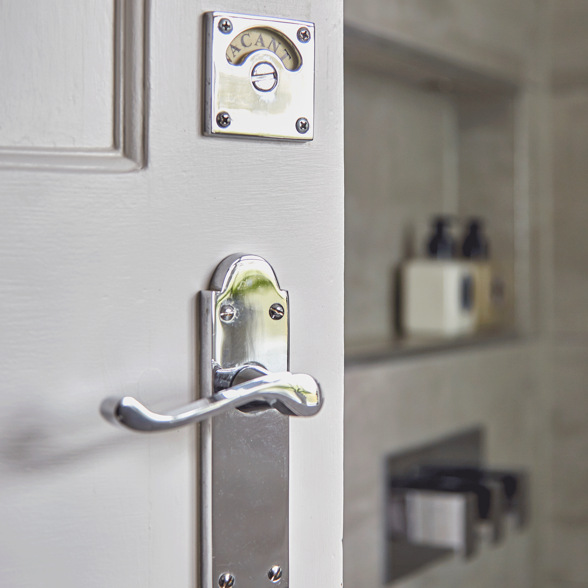 Grey door with silver handle and lock 