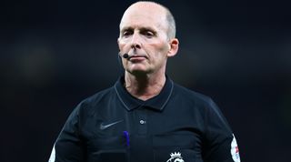 MANCHESTER, ENGLAND - APRIL 28: Referee Mike Dean during the Premier League match between Manchester United and Chelsea at Old Trafford on April 28, 2022 in Manchester, England. (Photo by Michael Steele/Getty Images)