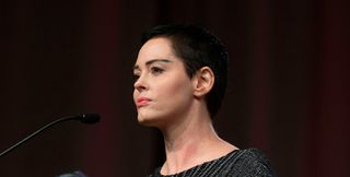 US actress Rose McGowan gives opening remarks to the audience at the Women's March / Women's Convention in Detroit, Michigan, on October 27, 2017. - A stream of actress including Rose McGowan, models and ex-employees have come out, many anonymously, to accuse Hollywood producer Harvey Weinstein of sexual harassment and abuse dating as far back as the 1990s. (Photo by RENA LAVERTY / AFP) (Photo by RENA LAVERTY/AFP via Getty Images)