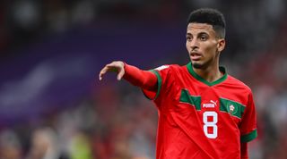 Azzedine Ounahi of Morocco points during the FIFA World Cup 2022 quarter-final match between Morocco and Portugal on 10 December, 2022 at the Al Thumama Stadium in Doha, Qatar.