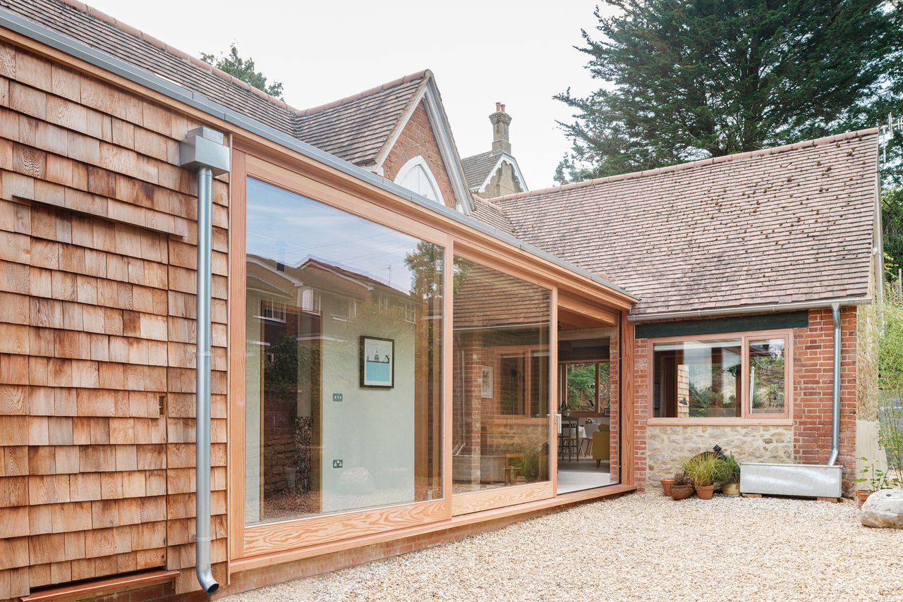 exterior of glass extension to stone barn building