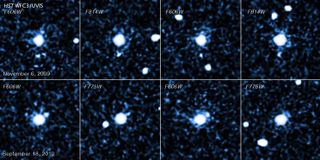 This sequence of images, taken by the Hubble Space Telescope's Wide Field Camera 3, shows a moon circling the dwarf planet 2007 OR10, informally known as “Snow White.” The top four images were taken Nov. 6, 2009; the bottom four, on Sept. 18, 2010.