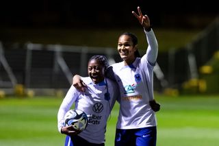 Kadidiatou Diani and Wendie Renard of France smile during a France Training Session at Valentine Sports Park on February 16, 2023 in Sydney, Australia.