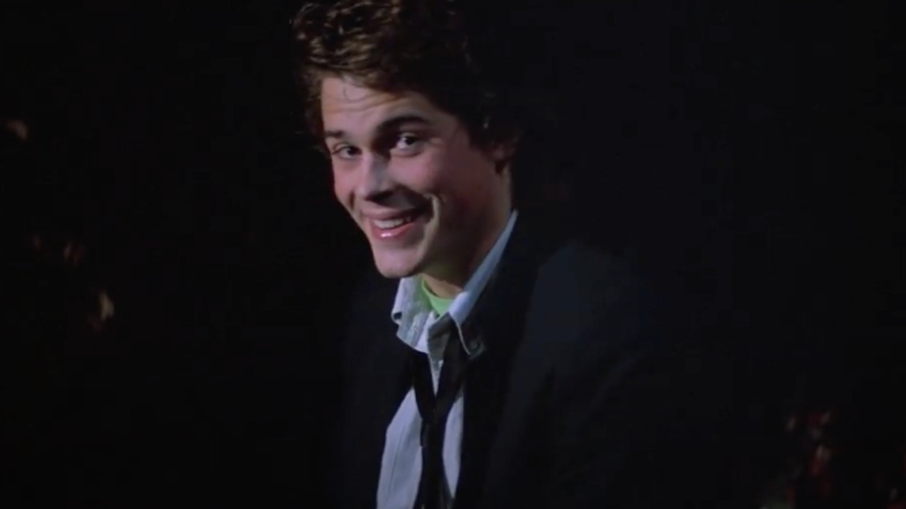 Billy Hicks (Rob Lowe) smiles in St. Elmo's Fire