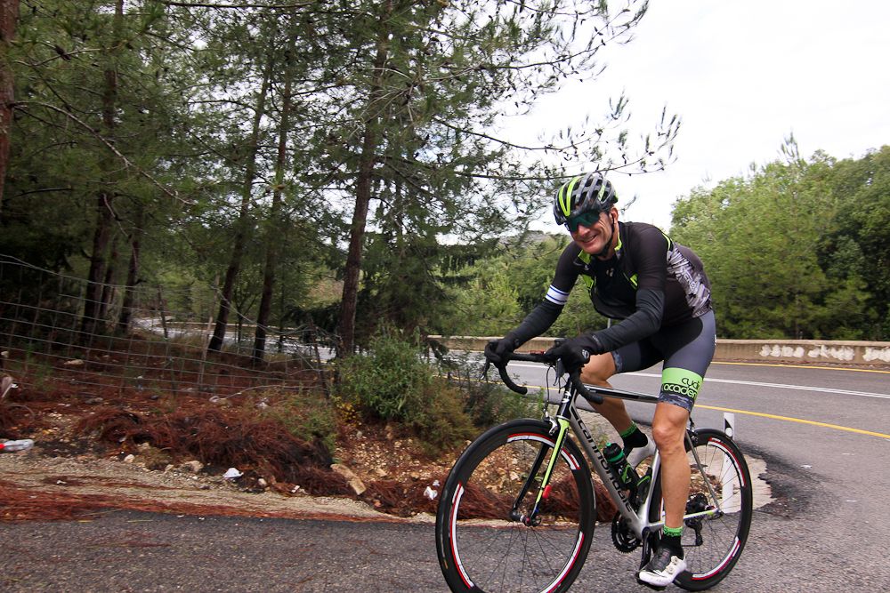 Team founder Ron Baron rounds a corner while climbing.