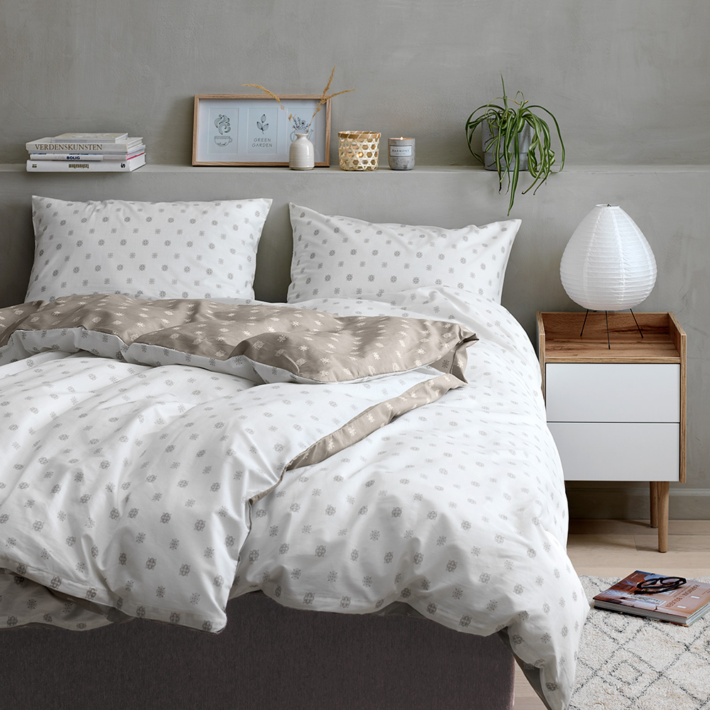 bedroom with grey wall and side table