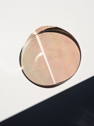 Round glass shape in light pink