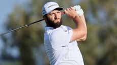 Jon Rahm takes a shot before the 2023 Sentry Tournament of Champions