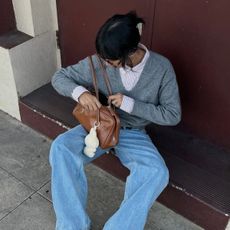 Stephanie Arant in light wash jeans