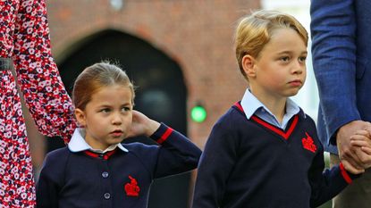 Britain's Princess Charlotte of Cambridge, with her brother, Britain's Prince George of Cambridge, arrives for her first day of school at Thomas's Battersea in London on September 5, 2019. (Photo by Aaron Chown / POOL / AFP) (Photo credit should read AARON CHOWN/AFP via Getty Images)