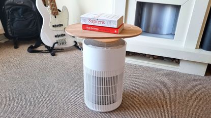 SwitchBot Air Purifier Table being tested by our reviewer