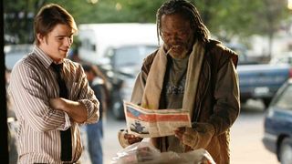 Samuel L. Jackson as a homeless former boxer reads a newspaper in Resurrecting the Champ