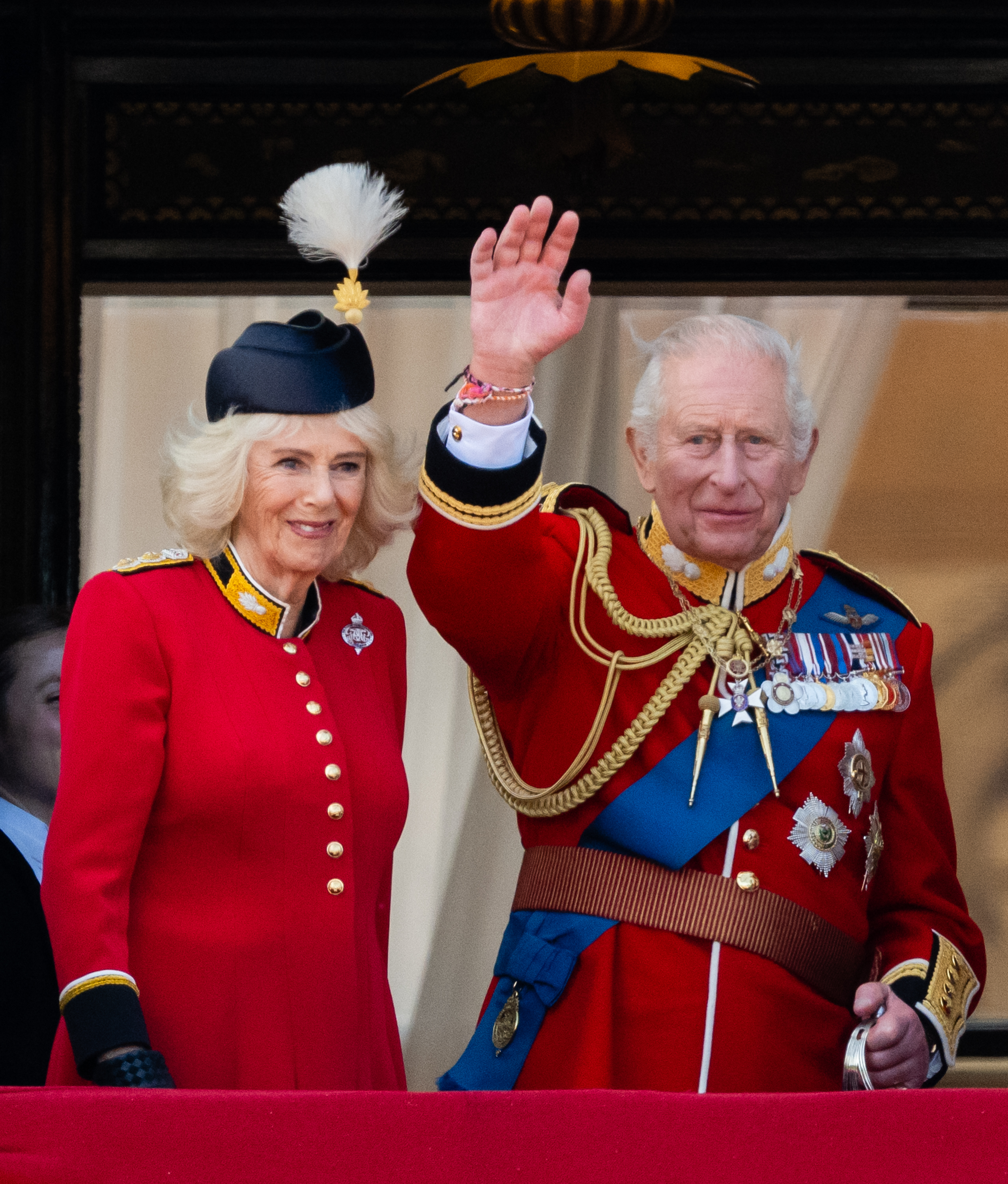 LONDON, ENGLAND - JUNE 13: (L-R) Queen Camilla and King Charles III watch an RAF flypast from the balcony of Buckingham Palace during Trooping The Colour on June 13, 2026 in London, England. (Photo by Samir Hussein/WireImage)