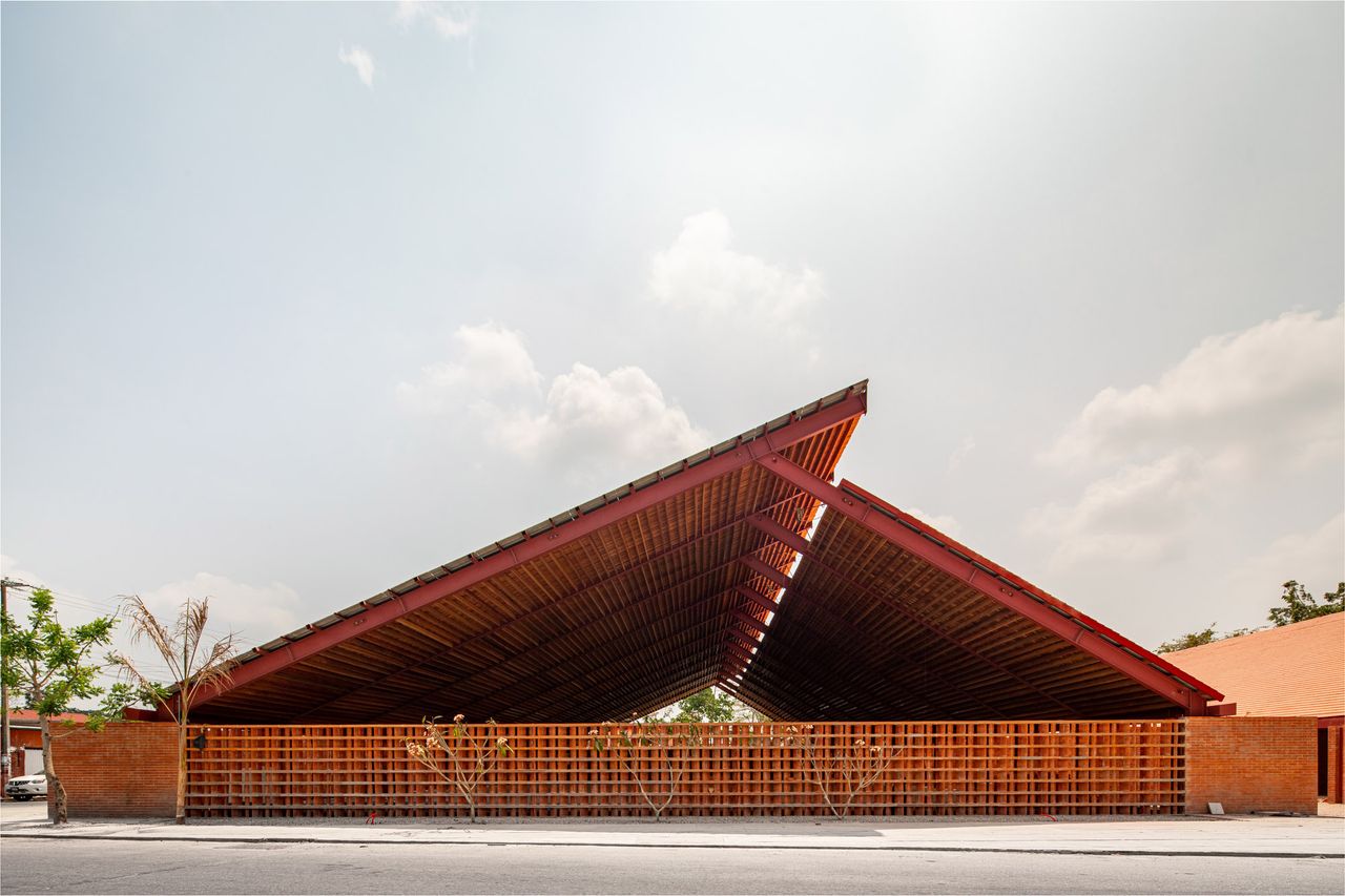 Matamoros Market. A large structure with a triangular red roof.