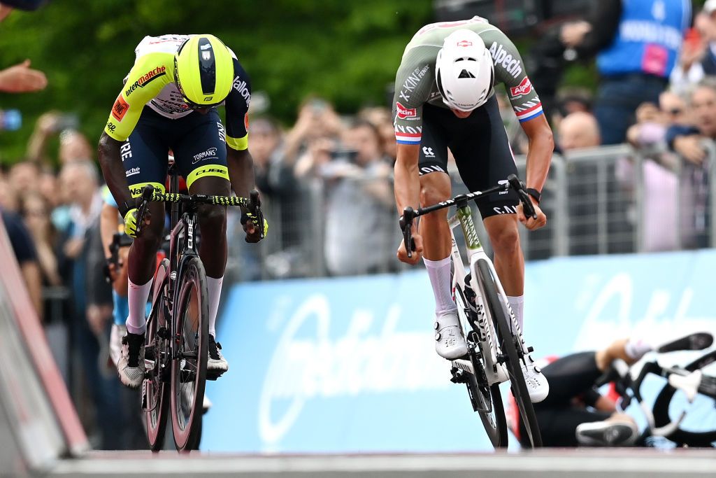 VISEGRAD HUNGARY MAY 06 LR Hailu Biniam Girmay of Eritrea and Team Intermarch Wanty Gobert Matriaux Mathieu Van Der Poel of Netherlands and Team Alpecin Fenix and Caleb Ewan of Australia and Team Lotto Soudal crash sprint at finish line during the 105th Giro dItalia 2022 Stage 1 a 195km stage from Budapest to Visegrd 337m Giro WorldTour on May 06 2022 in Visegrad Hungary Photo by Stuart FranklinGetty Images