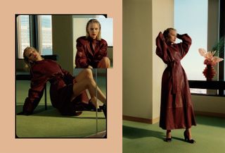 Grace VanderWaal in a green-carpeted empty office setting wearing a burgundy leather trench coat by Khaite with black peep-toe pumps and leather gloves.