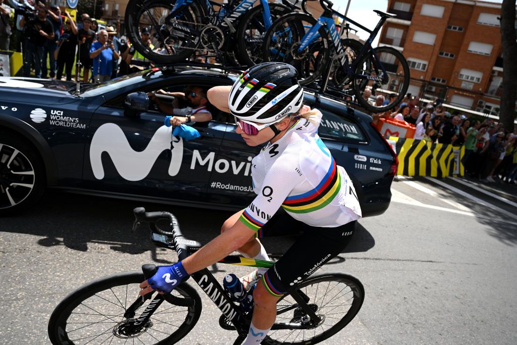 LA RODA SPAIN MAY 03 Annemiek Van Vleuten of The Netherlands and Movistar Team picks bottles and food from the team car during the 9th La Vuelta Femenina 2023 Stage 3 a 1578km stage from Elche de la Sierra to La Roda UCIWWT on May 03 2023 in La Roda Spain Photo by Dario BelingheriGetty Images