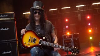 Slash with Epiphone Slash Les Paul Standard in November Burst finish