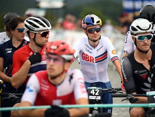 Great Britain’s Thomas Pidcock was moved up one row at the start of the elite men’s XCO race