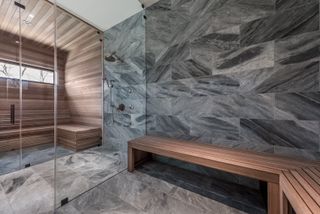 A bathroom that integrates a home sauna