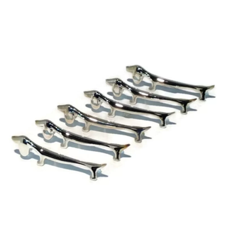 six cutlery rests shaped like dogs