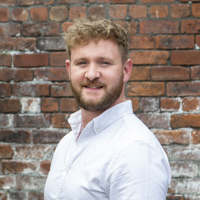 headshot of surveyor Joshua Weston
