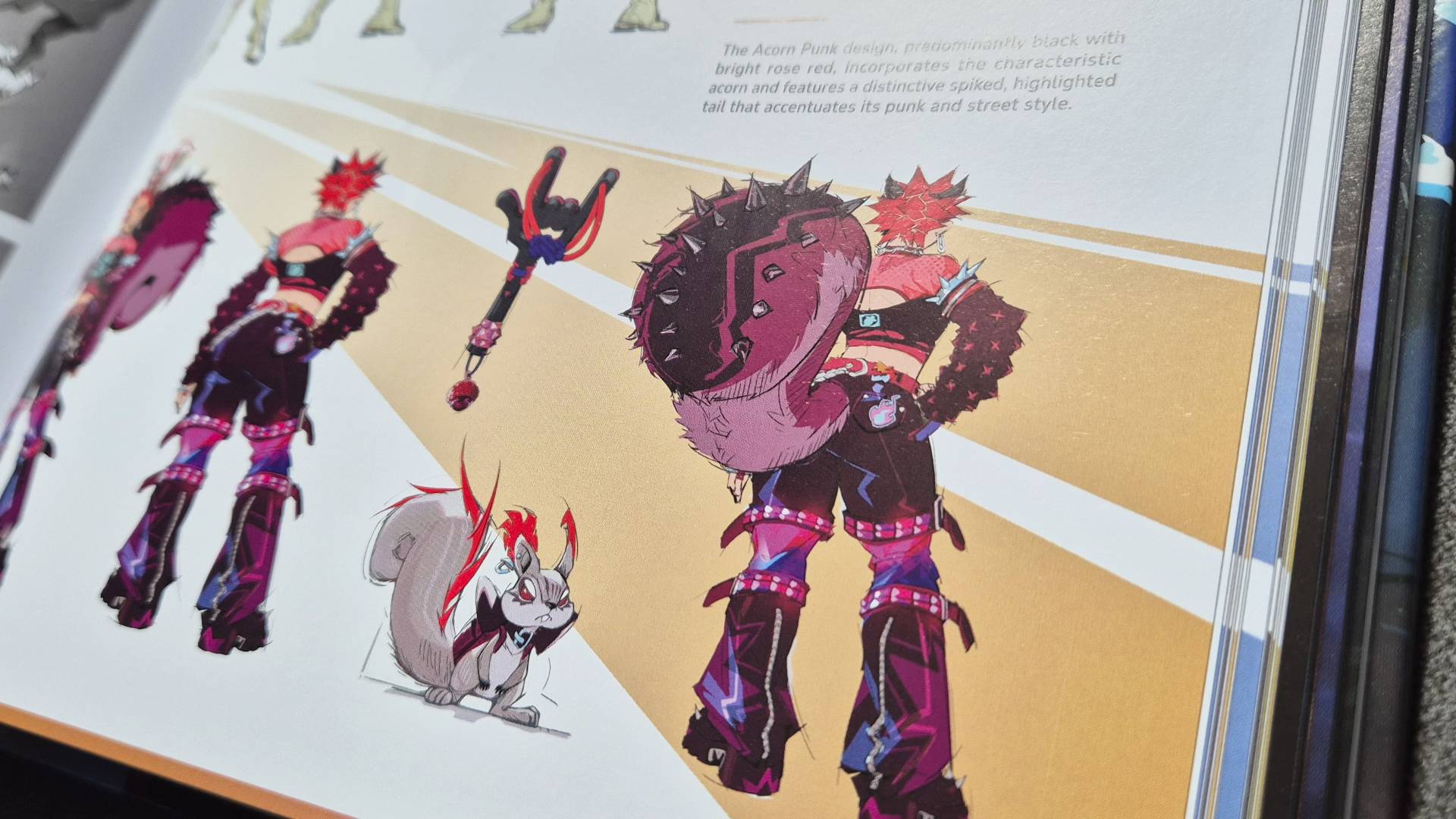 Photo by Rosalie Newcombe of a page in the Art of Marvel Rivals book showing off Squirrel Girl&#039;s punk outfit.