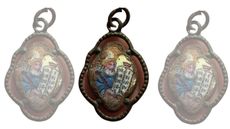 A pendant featuring Moses holding the Ten Commandments, which was found by the gas chambers located in Camp II at Sobibor.