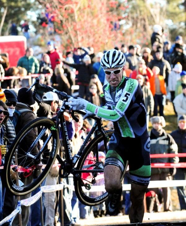 Jeremy Powers (Cannondale-Cyclocrossworld.com) at the barriers after losing ground due to a crash.