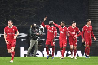 Liverpool’s Sadio Mane (centre) celebrates scoring their side’s third goal of the game with team-mates during the Premier League match at the Tottenham Hotspur Stadium, London. Picture date: Thursday January 28, 2021