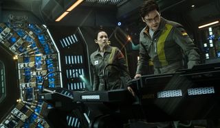The Cloverfield Paradox crew members monitoring the power experiment