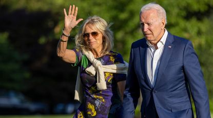 U.S. President Joe Biden and first lady Jill Biden walk on the south lawn of White House on June 27, 2021 in Washington, DC. The Bidens and staffers spent the weekend at Camp David.