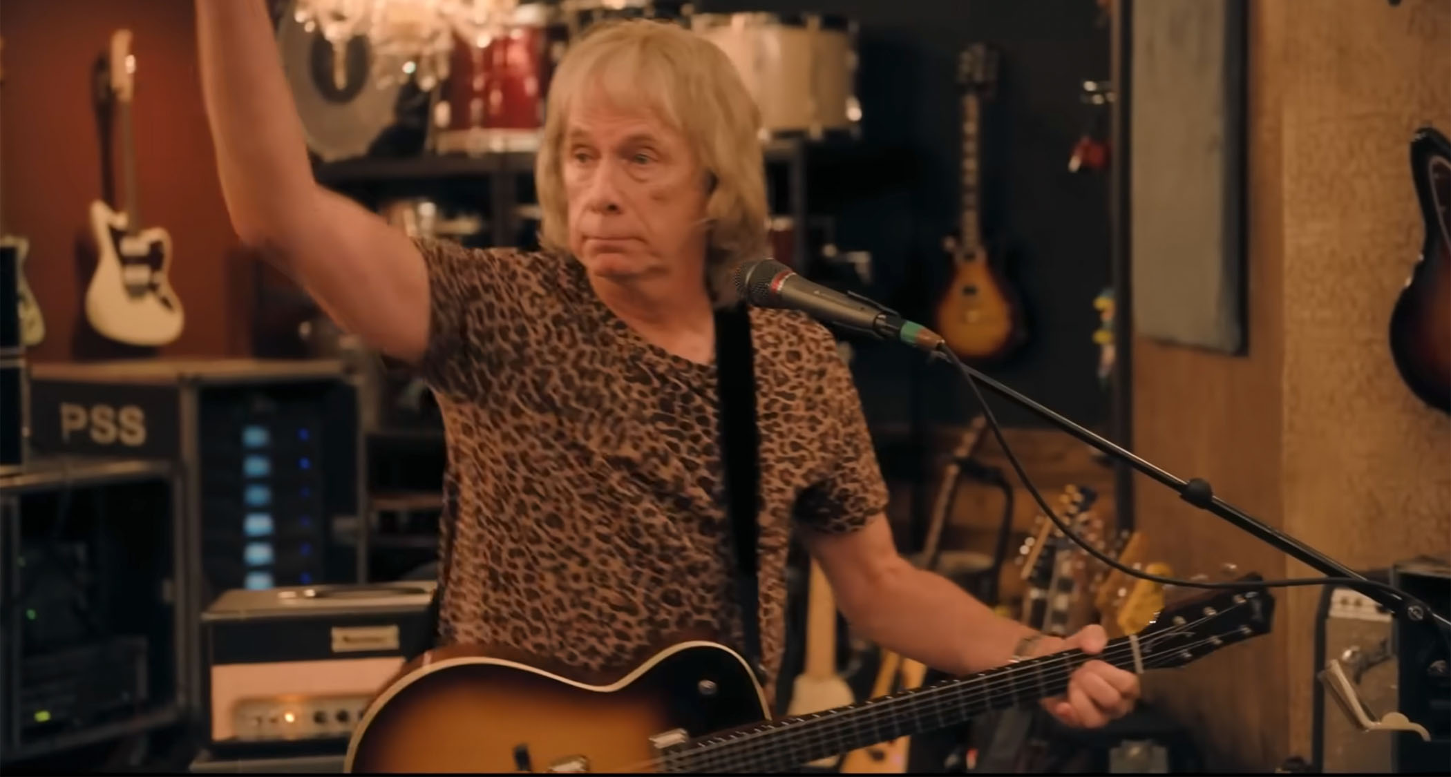 There's Nigel Tufnel in the studio with a Julian Lage signature Collings. Some Jazzmasters and Marshall amps are in the background.