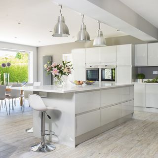 white kitchen room with white cabinets