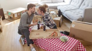 Couple enjoying an indoor picnic