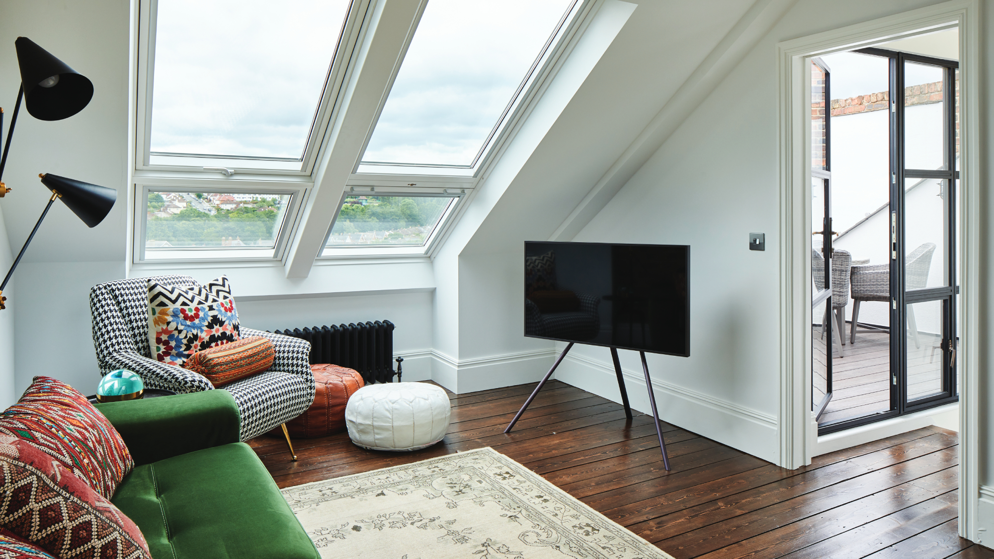 loft conversion with living room leading onto terrace