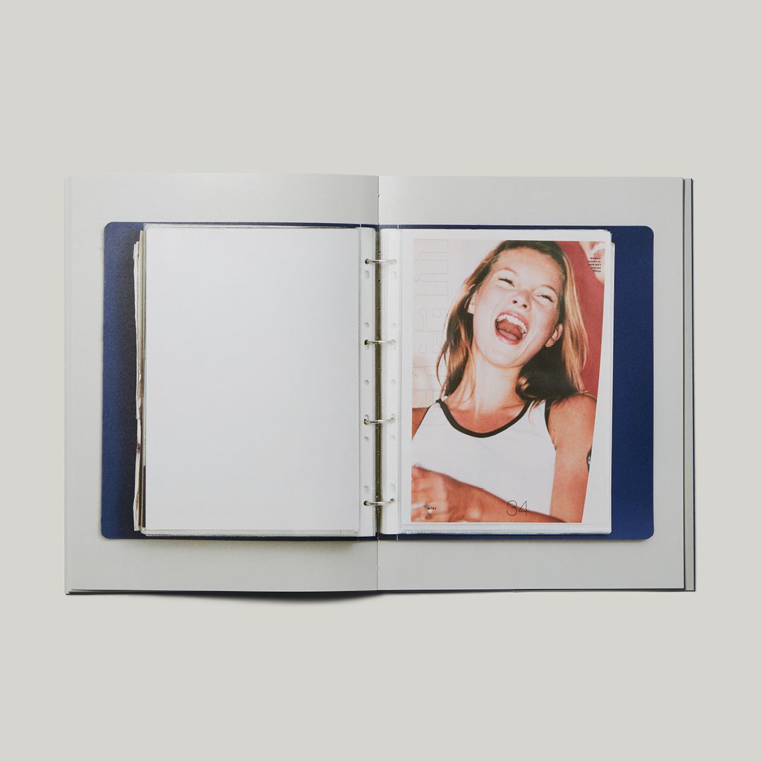 Spread of book featuring image of Kate Moss