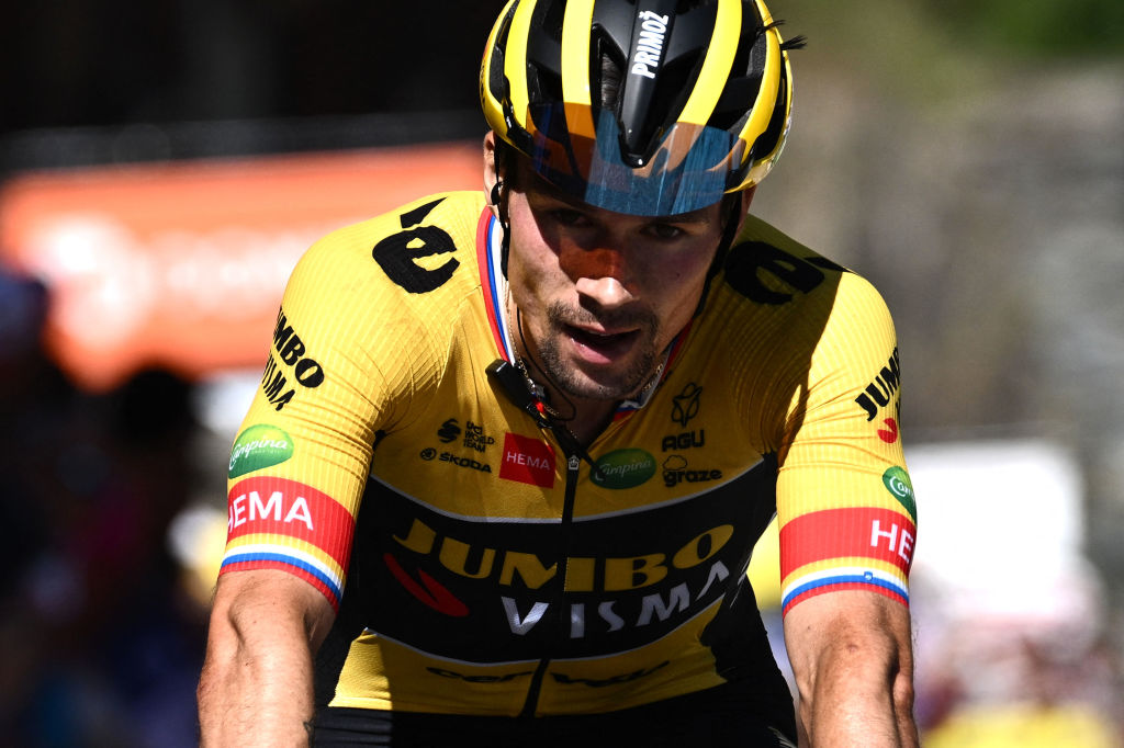 JumboVisma teams Slovenian rider Primoz Roglic reacts as he crosses the finish line at the end of the seventh stage of the 74th edition of the Criterium du Dauphine cycling race 135kms between SaintChaffrey to Vaujany southeastern France on June 11 2022 Photo by Marco BERTORELLO AFP Photo by MARCO BERTORELLOAFP via Getty Images