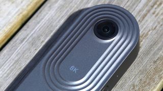 Trisio Lite2 360 camera on a wooden surface