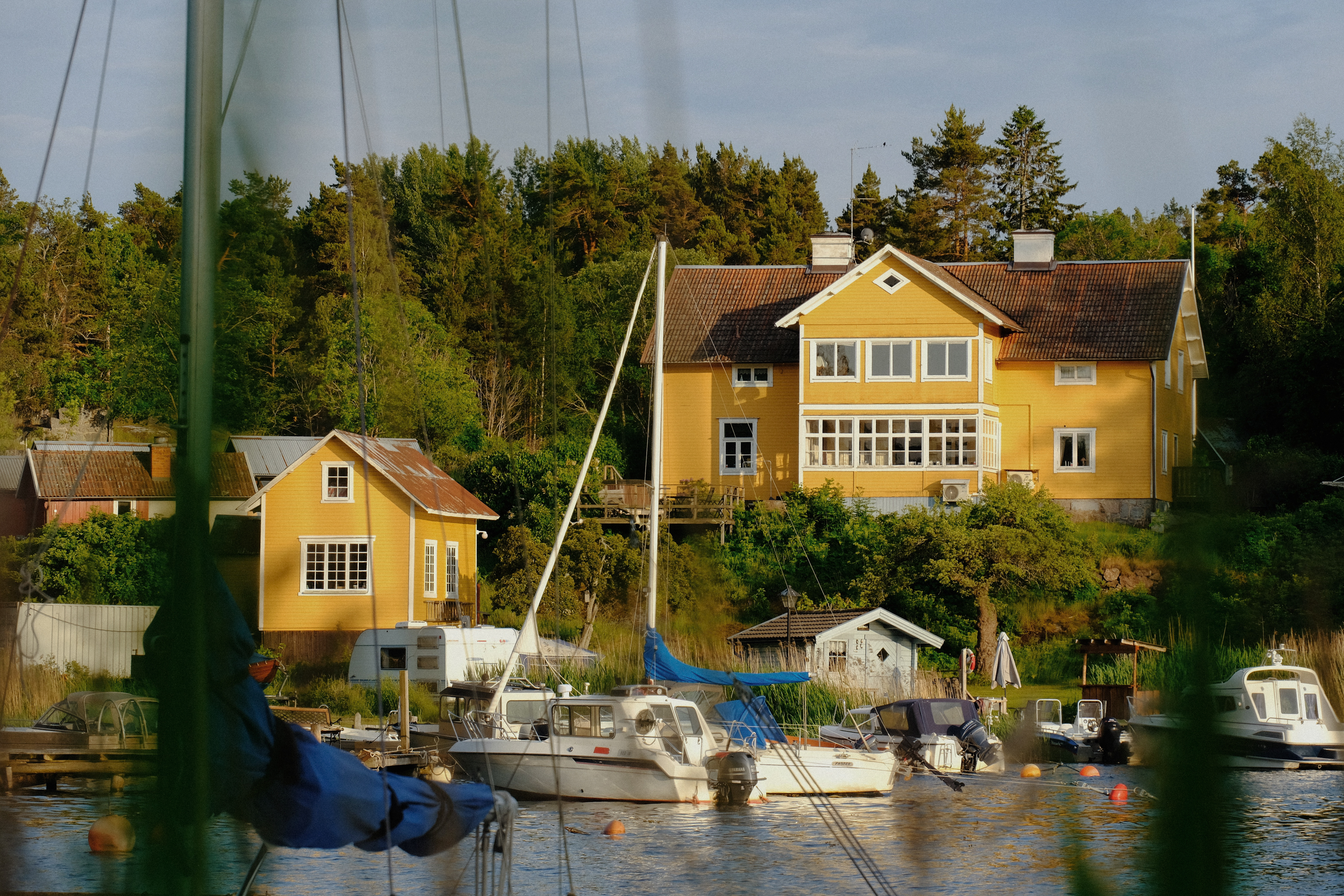 Yellow clad houses on the water's front in the Stockholm Archipelago