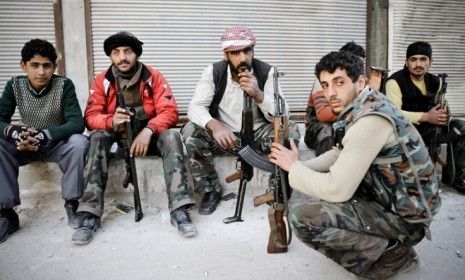 Free Syrian Army rebels prepare to counter-attack Bashar al-Assad&amp;#039;s government tanks on April 9: Syria is now tangled in a diplomatic dispute with Turkey, after shooting down one of Ankara&amp;#039;s 