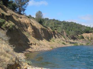 Sediments like these along the Yuba River in northern California can be eroded by large floods, unleashing mercury pollution into the water. 