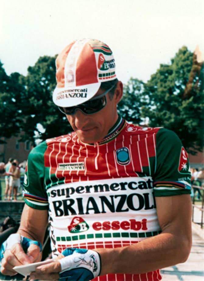 Moser signs an autograph