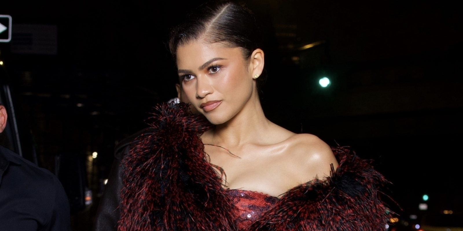 Zendaya exudes elegance as she swaps her white Met Gala-themed suit for a stunning red dress,