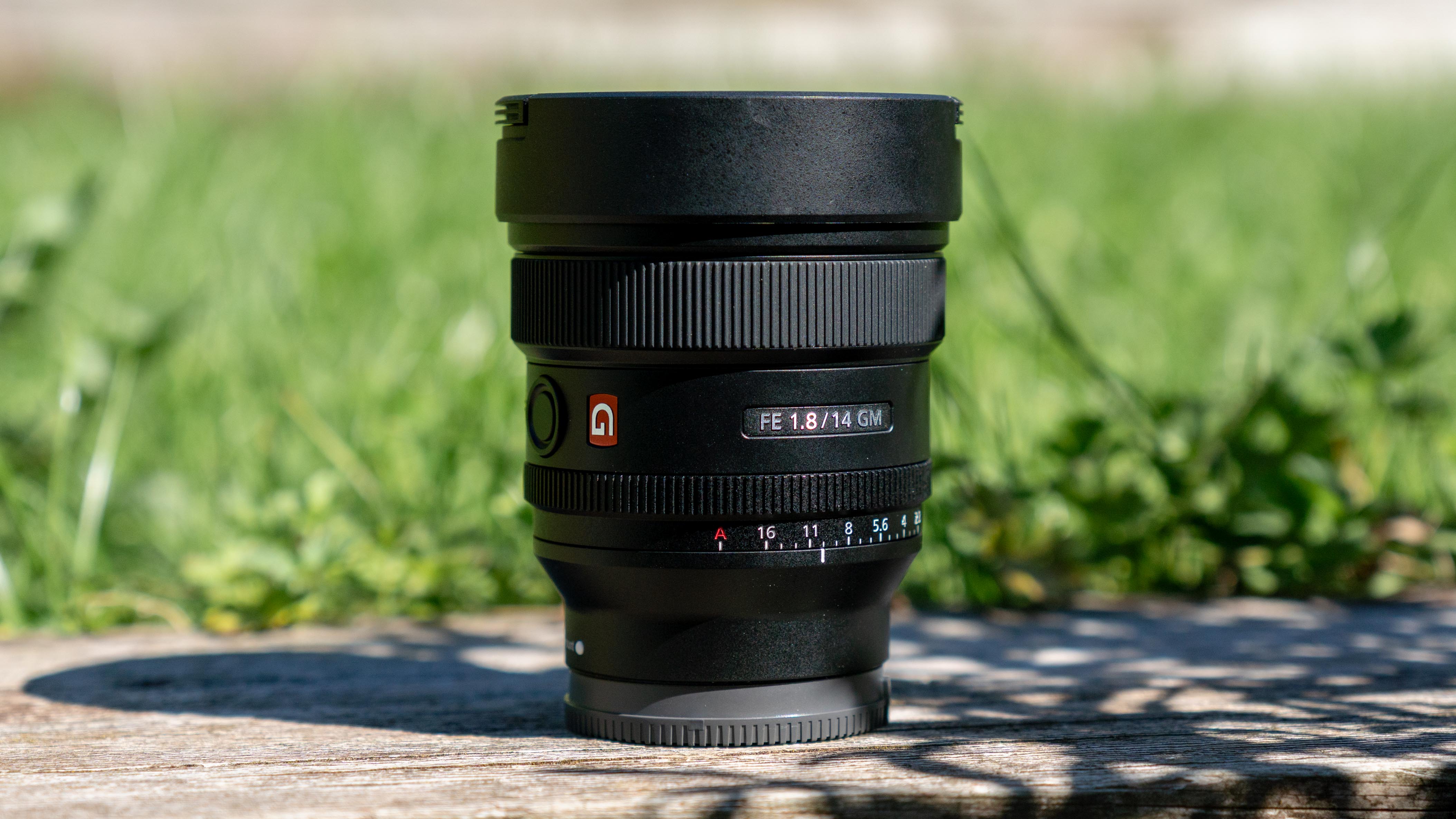 Sony FE 14mm f/1.8 GM against a green background