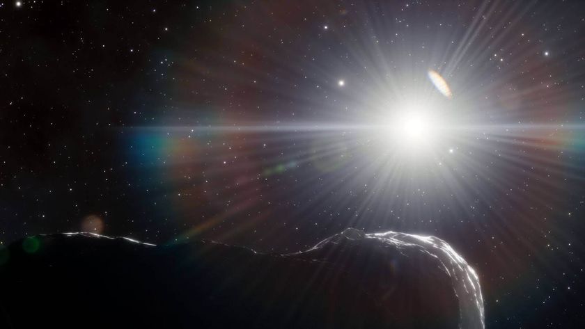 An asteroid in the foreground is illuminated by a bright star behind it in space.
