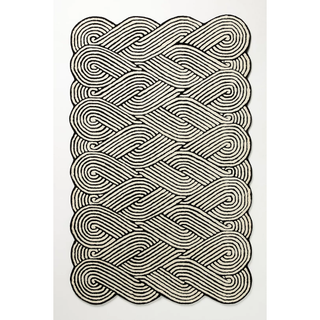 black and white rug with woven pattern